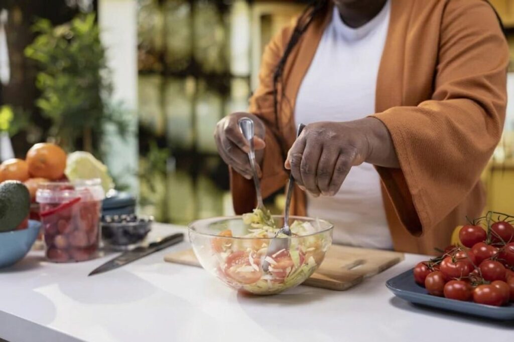 Preparing a quick plant-based bowl with meal-prepped ingredients.